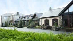 Mulroy Woods Hotel logo