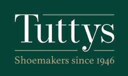 Tuttys Shoemakers logo