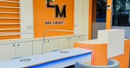 EM Nail & Beauty logo
