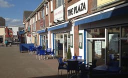 The Plaza Restaurant logo