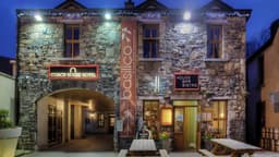 Coach House Hotel logo