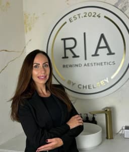 Rewind Aesthetics logo