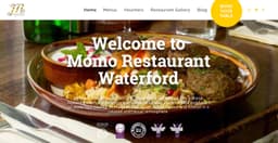 Momo Restaurant logo