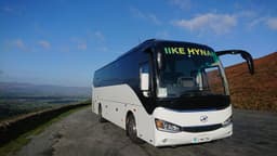 Hynan Travel logo