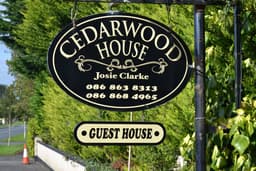 Cedarwood House B&B logo