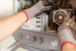 Johnny Murphy Plumbing and Heating Services logo