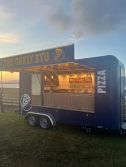 The Curly Stu logo