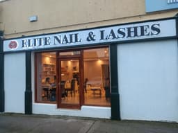 Elite Nail & Lashes logo