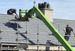 Peaktop roofing and guttering logo