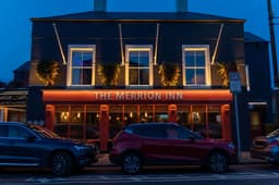 The Merrion Inn logo