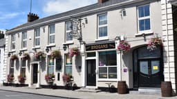 Brogan's Bar & Hotel logo