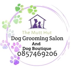 The Mutt Hut Dog Grooming Salon logo