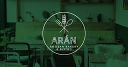 Arán Deli & Bakery logo