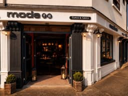 Mode Tapas & Grill logo