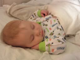 Amelie Nyhan Postpartum Doula PCD(DONA) logo