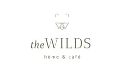The Wilds Home & Cafe and Drive Thru logo