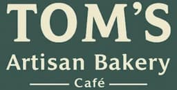 TOM'S Artisan Bakery & Café logo