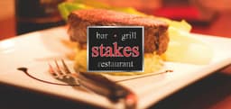 Stakes Restaurant logo