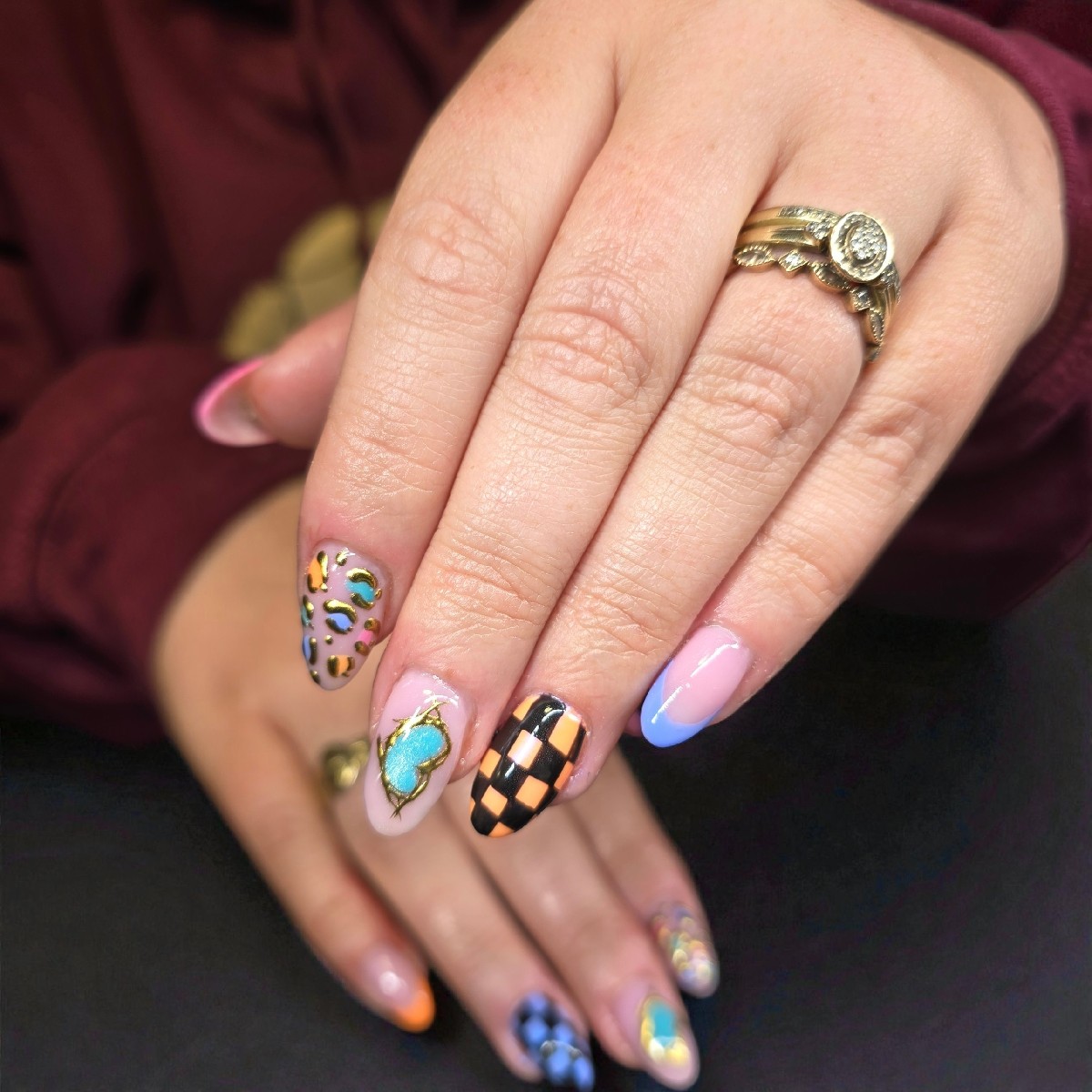 Rag Nails to Riches logo